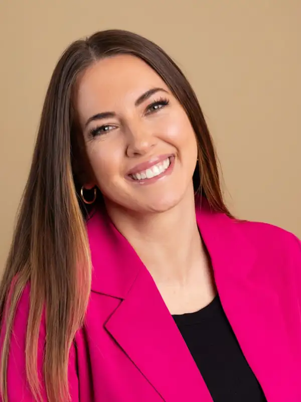 Founder of Tandem Surrogacy smiling in a professional portrait, representing compassionate and ethical surrogacy leadership