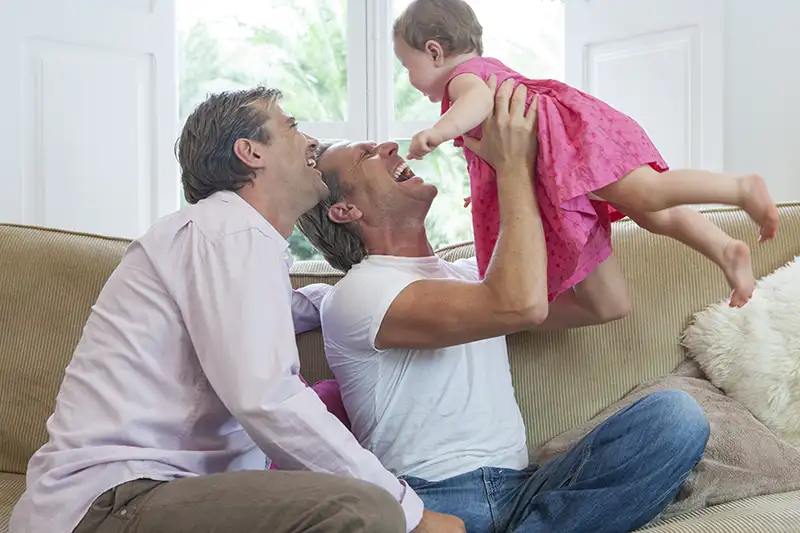 Intended parents and gestational carrier speaking with a surrogacy coordinator at Tandem Surrogacy.