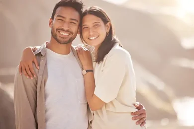 Intended parents embracing after learning about Tandem Surrogacy’s screening and matching process